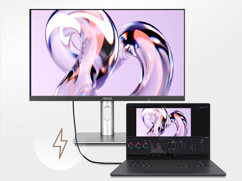 A workspace showcasing a sleek ProArt monitor and laptop connected via a Thunderbolt™ 4 port.